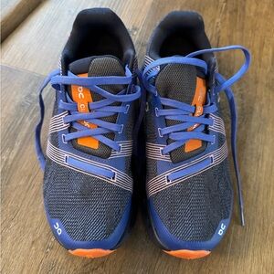 On Running Black and Purple Shoes